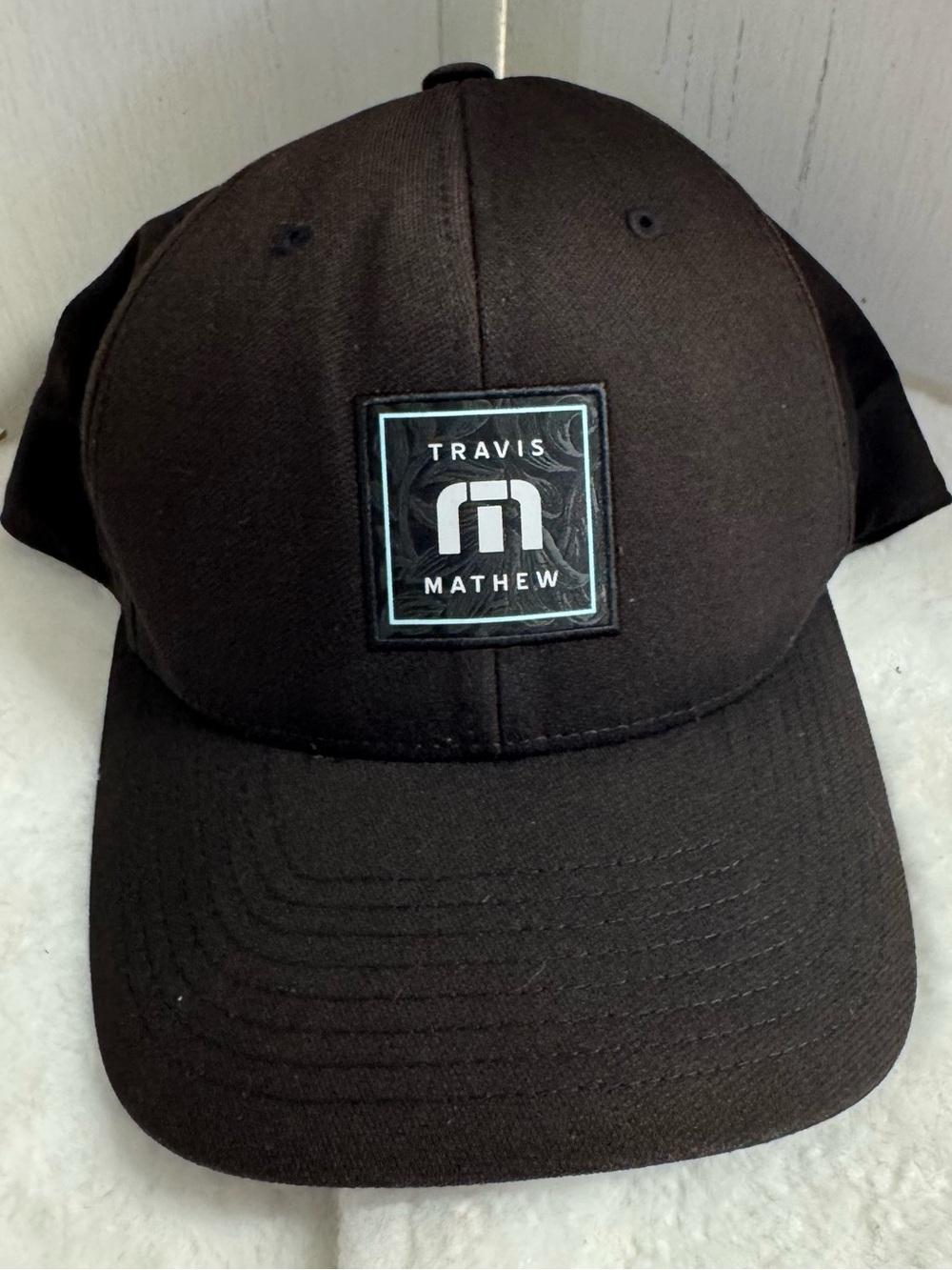 Travis Mathew Black Baseball Cap with Logo Patch